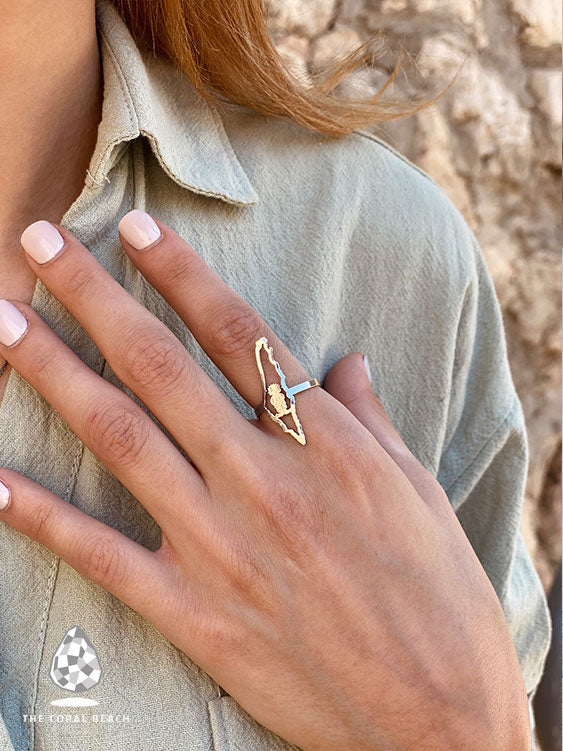 Palestine map with Handala inside ring