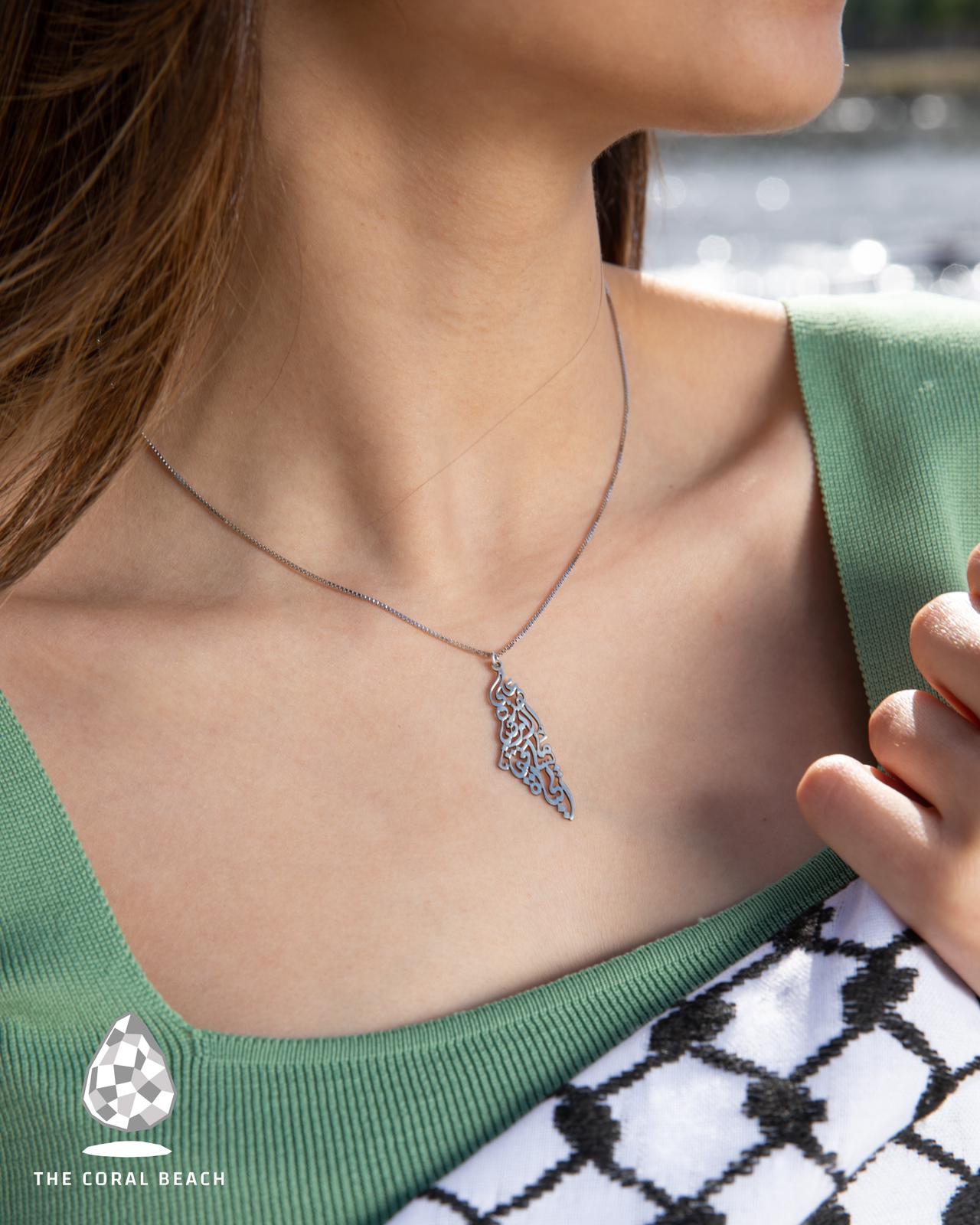 Palestine map with Palestinian famous poem written inside necklace