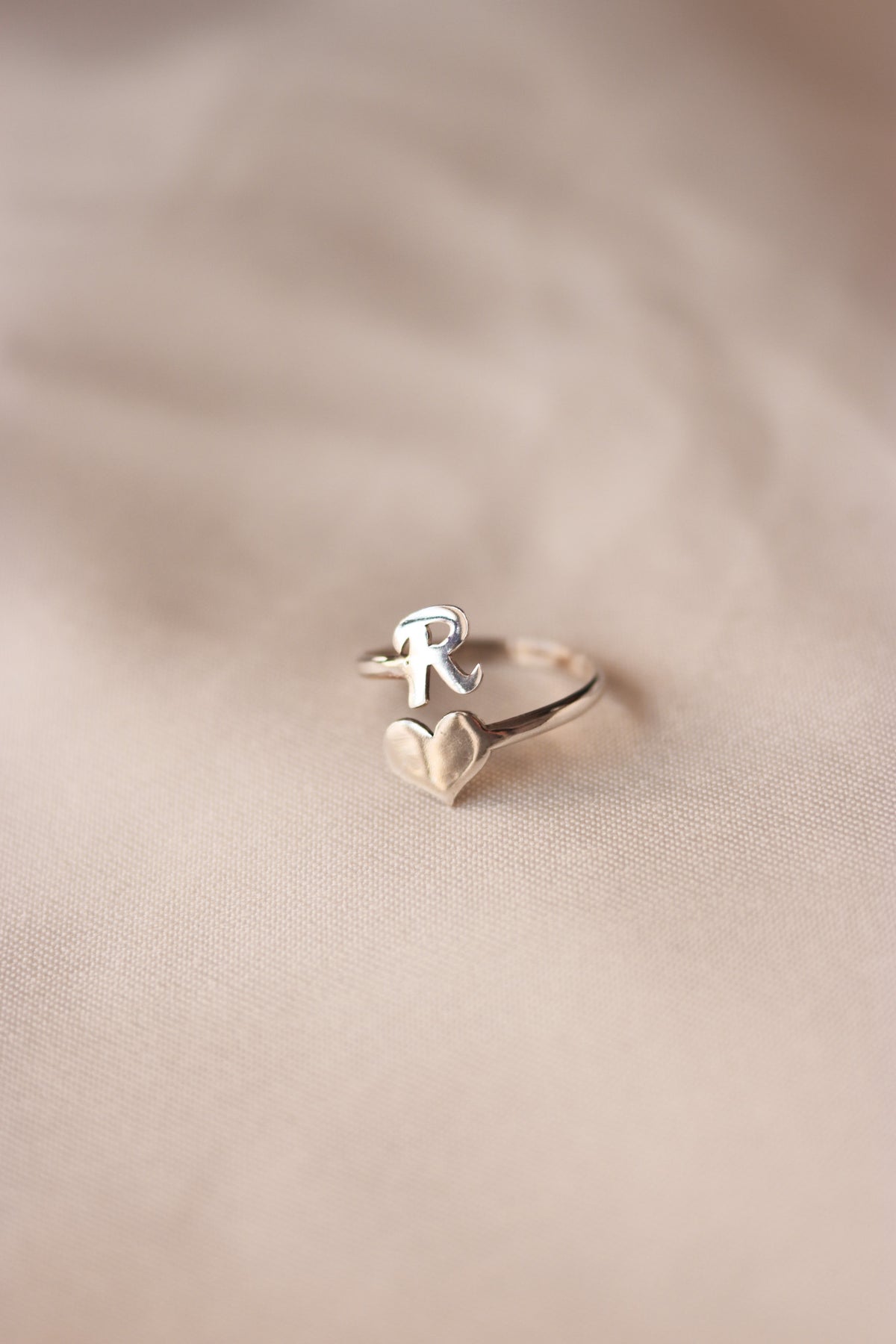 Letter ring with a heart