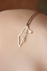 Palestine map with vertical Palestine Arabic word necklace with a symbolic spoon